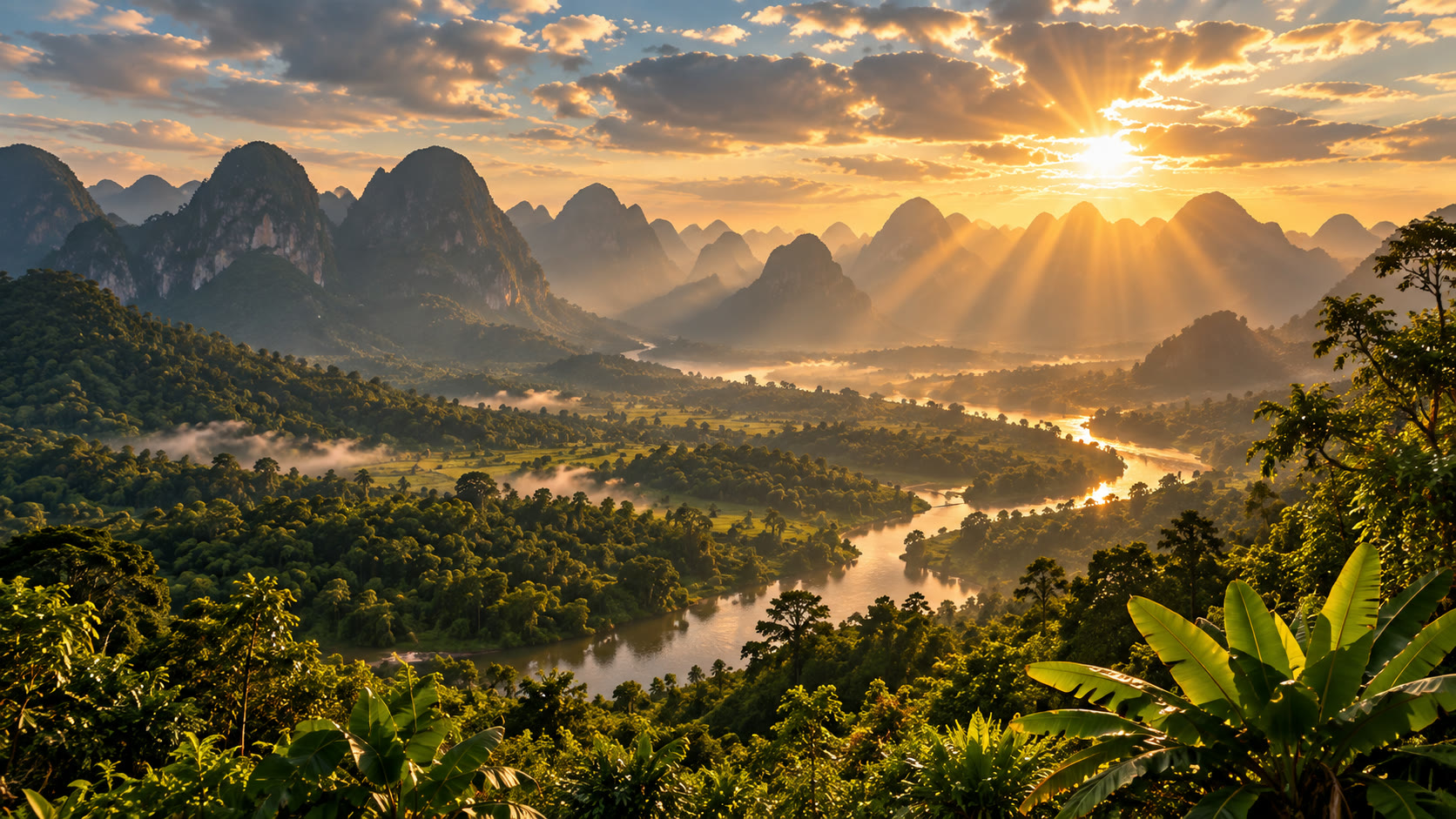 Sunbeams over a winding river and forested limestone mountains
