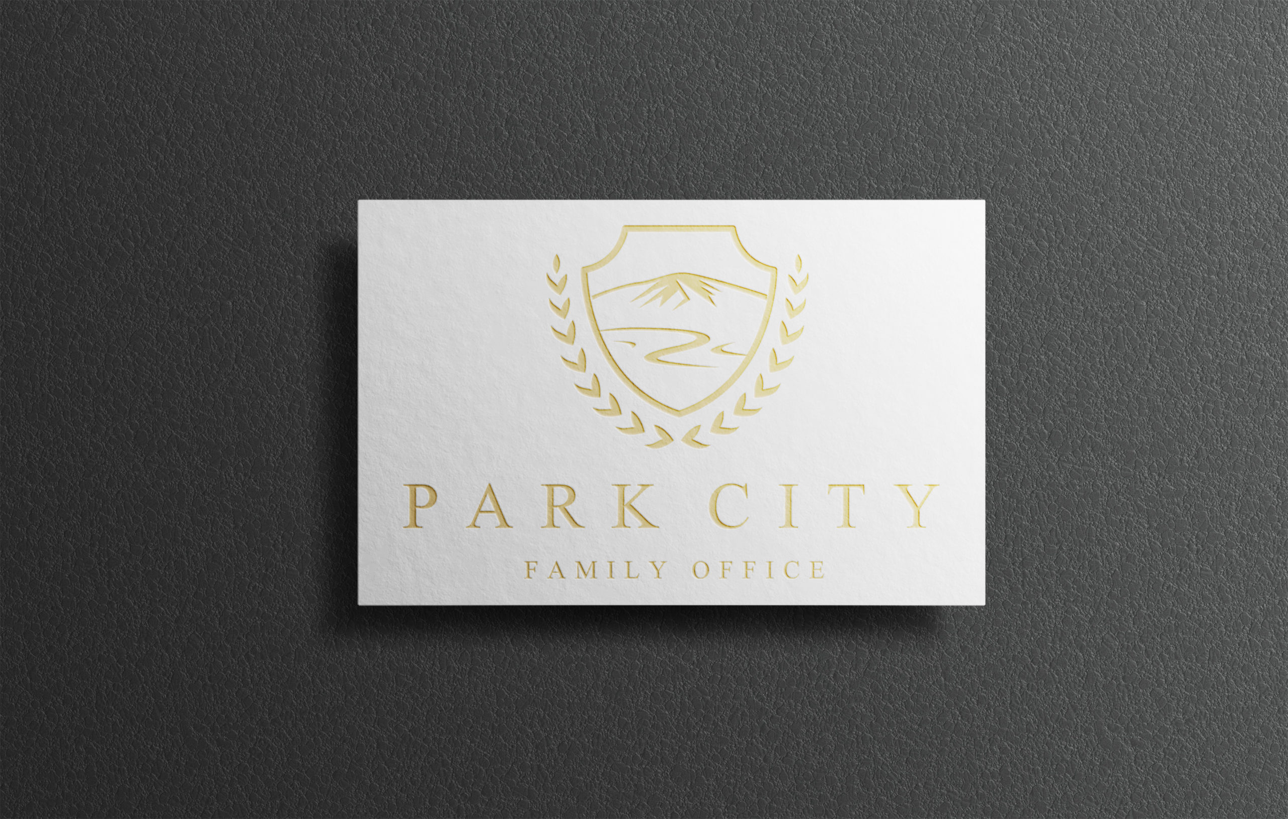 The Park City Family Office logo pays homage to the beautiful area they live in while being opulent for their family office lcients.