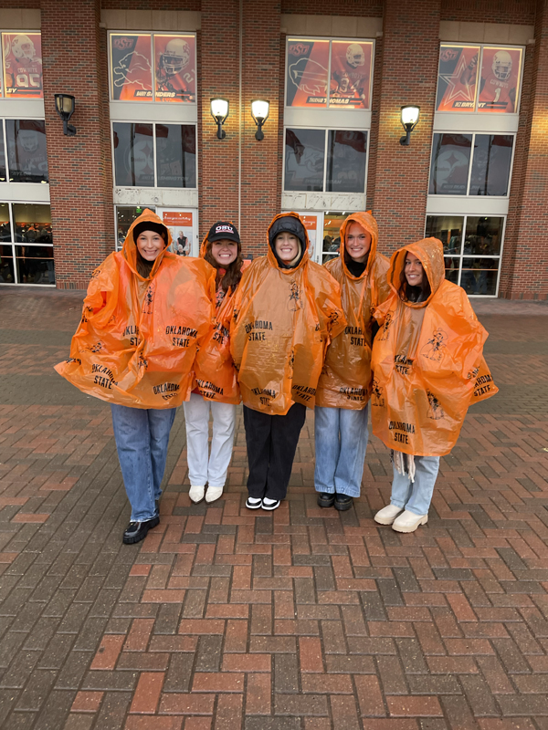 My friends and I love to support our Cowboy football team, rain or shine!